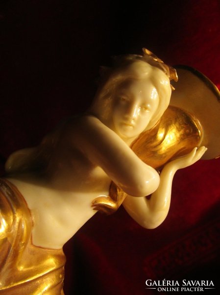 Antique marked porcelain candle holder in the shape of a woman, gilded