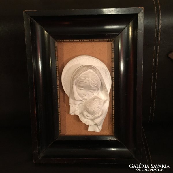 Antique plaster icon in a wooden frame, cheap, attractive