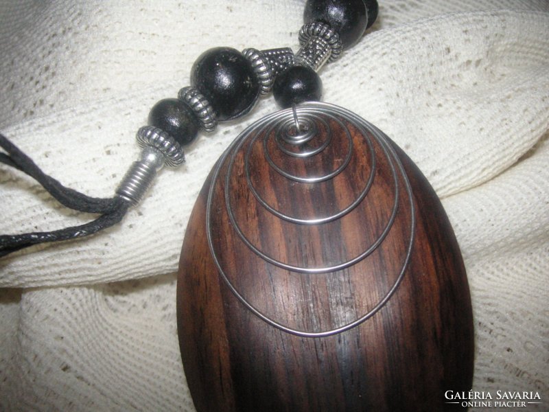 Necklace metal, wood, leather, the pendant is made of beautiful veined ebony wood