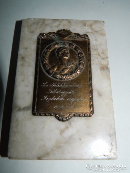 Volleyball commemorative medal on marble