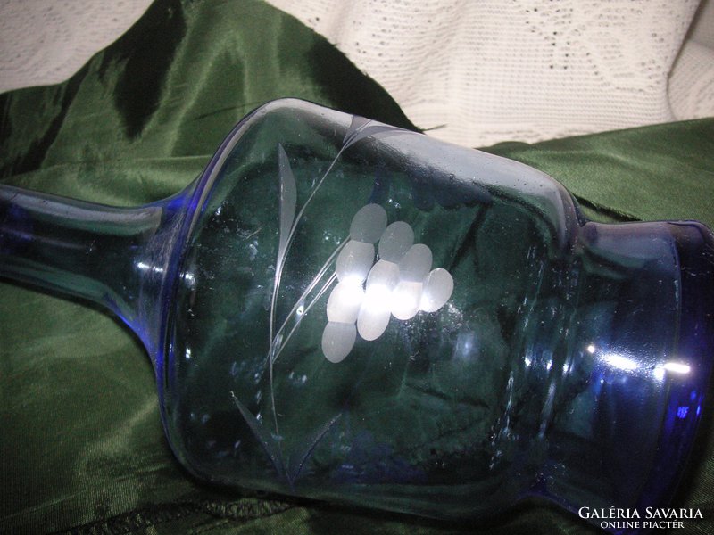 Torn, polished blue glass