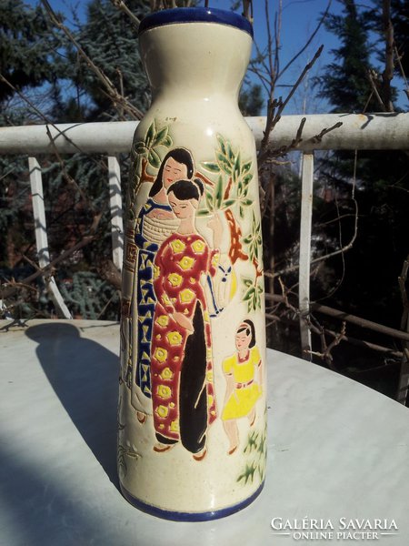 Vintage asian ladies with vase