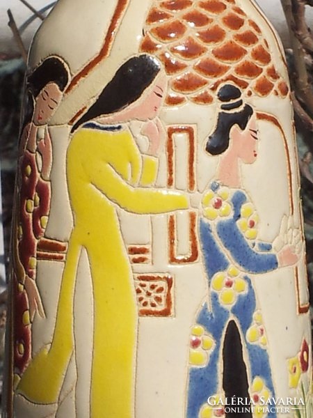 Vintage asian ladies with vase