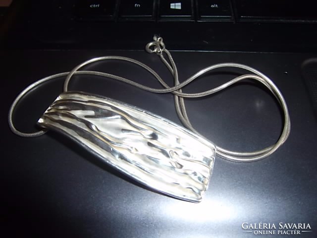 Crumpled silver pendant
