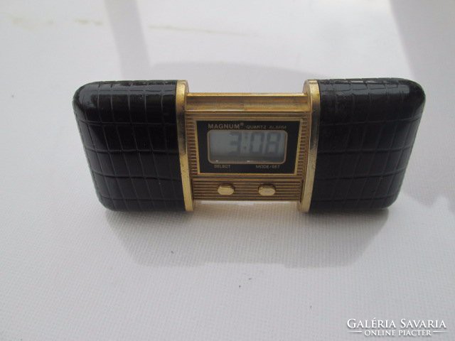 A real rarity from the '80s, a quartz travel watch in a croco case