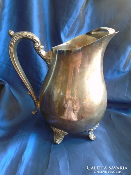 Silver-plated English jug, pouring. 21.5 cm High.