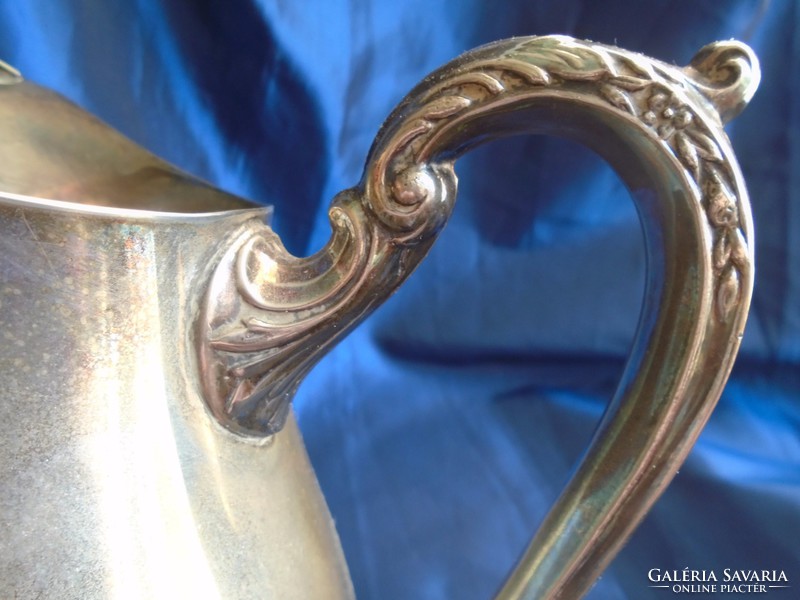 Silver-plated English jug, pouring. 21.5 cm High.