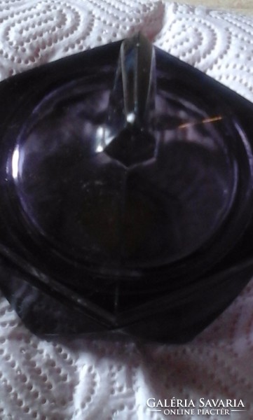 Old dark purple glass container with lid