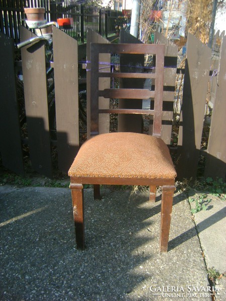 Antique sprung chair with padded back