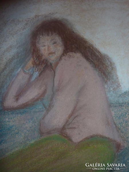 Resting girl with pastel sign