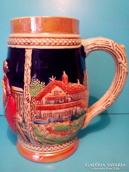 Good price! Ceramic majolica jug decorated with relief is excellent as a gift for revelers