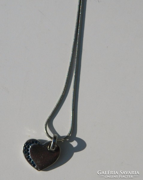 Silver colored blue stone heart pendant with chain - necklace