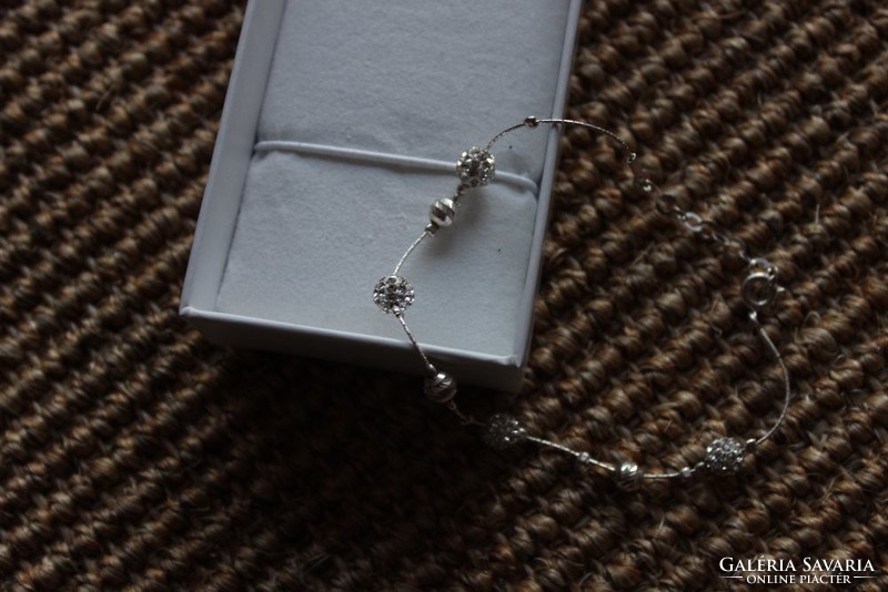 Silver necklace and bracelet with silver balls