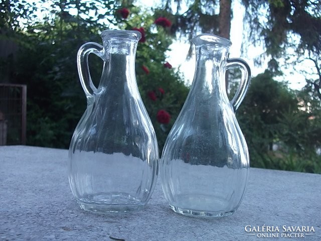 Pair of jugs and oil-vinegar pourers with a retro-beautiful shape