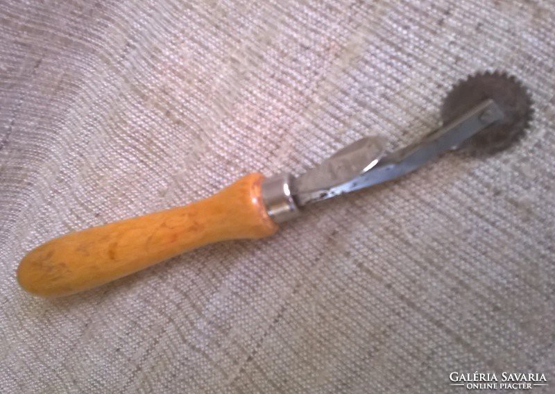 Old leather rádli with wooden handle