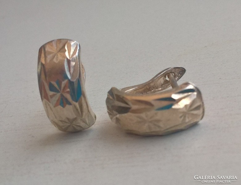 Marked silver stud earrings