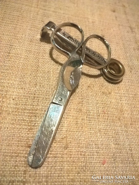 Old marked Míve cigar cutting scissors with a set of pipe cleaners