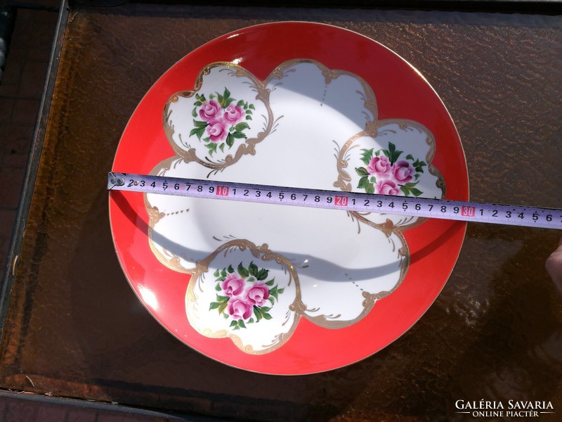 A pink Russian decorative plate from Soviet times