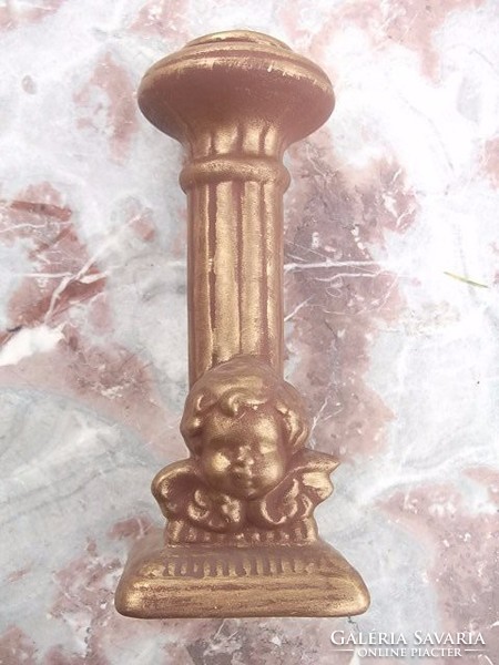 Hourglass candle holder with angel head and putti