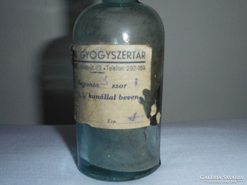 Old medicinal glass bottle - angel pharmacy - field pharmacist - from the 1920s
