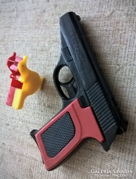 Retro toy gun and bird-shaped whistle in one