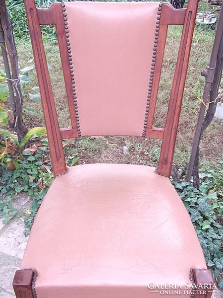 Art deco leather-upholstered chair, solid and stable