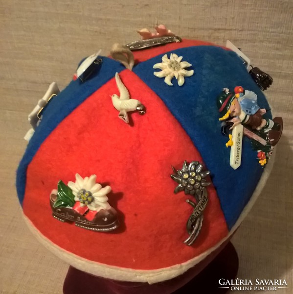 Old kipa headgear in good condition with several tourist relics
