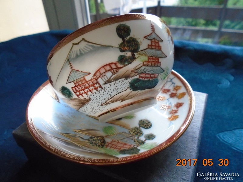 Kutani hand painted golden contoured Japanese eggshell with tea cup placemat