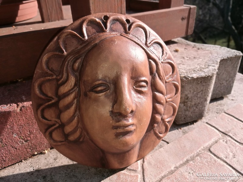 Art Nouveau female head, wall decoration