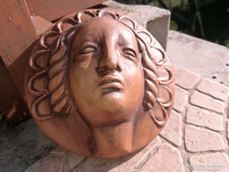 Art Nouveau female head, wall decoration