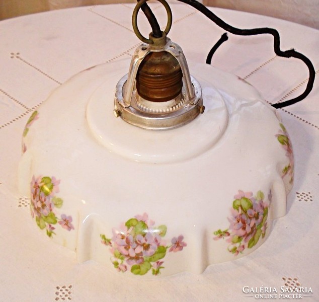 Antique, violet-patterned milk glass lampshade with socket