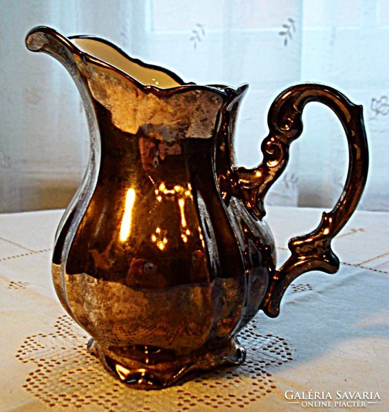 Silver-plated porcelain milk jug