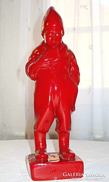 Zsolnay little boy eating bread, carrying a bag - eosin ox blood glaze miniature sculpture