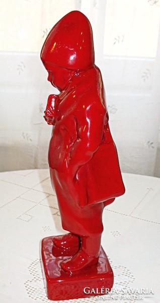 Zsolnay little boy eating bread, carrying a bag - eosin ox blood glaze miniature sculpture