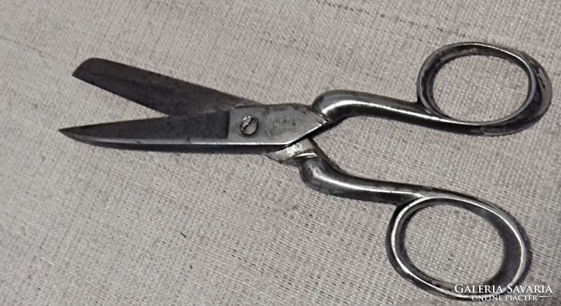 Old wrought iron cutting scissors. Cleaned surface treatment