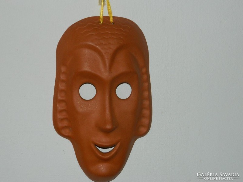 Wall-mounted ceramic mask - you can even put it on...