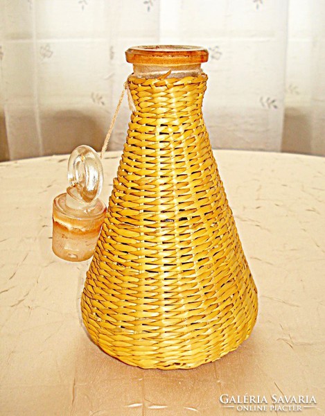 Old French straw-woven perfume bottle with its own stopper
