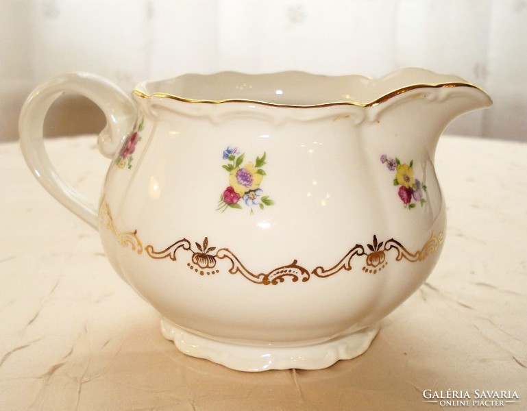Baroque milk or cream jug with a small flower pattern
