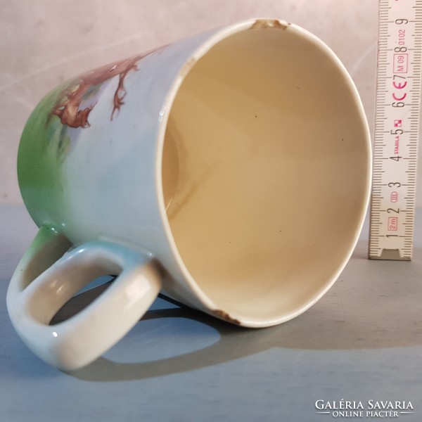 Ceramic mug with deer pattern