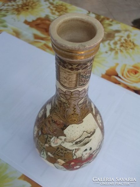 Antique Chinese hand-painted vase indicates.