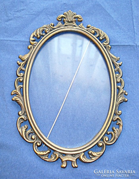 A pair of baroque glazed wall bronze picture frames