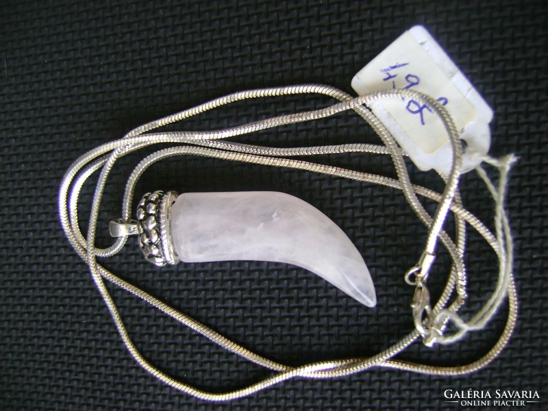 A huge rose quartz pendant with a gift necklace