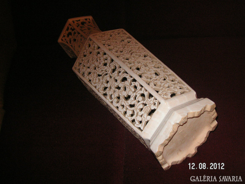 A large openwork vase, without a mark, (perhaps fischer) can be a nice decoration for the apartment