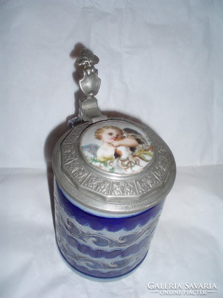 Stone-glazed, antique jug with porcelain lid