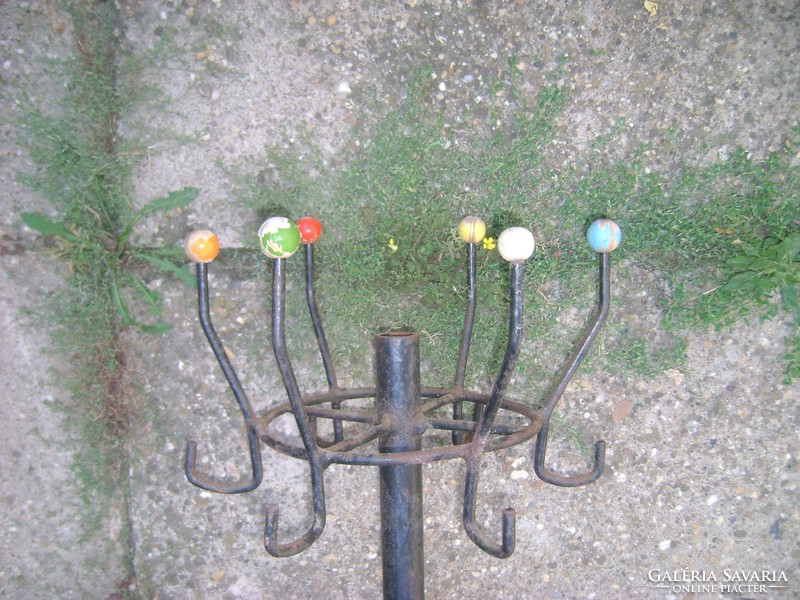 Retro wrought iron rack with wooden buttons