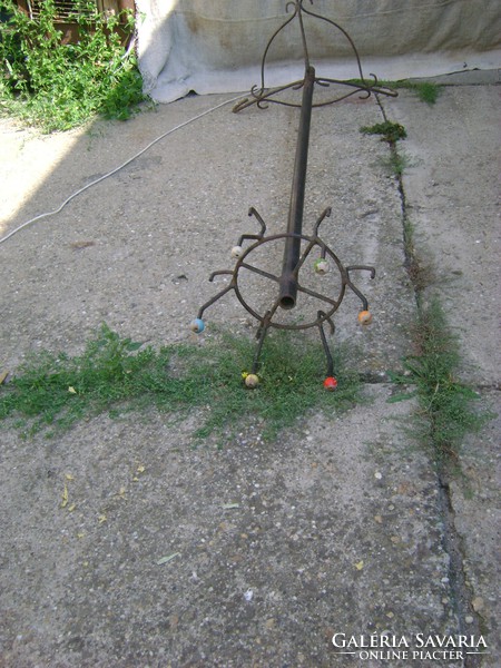 Retro wrought iron rack with wooden buttons