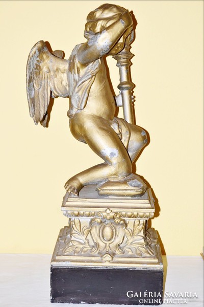 Gilded building ornament with an angel's torch, painted tin plate, 81 cm high