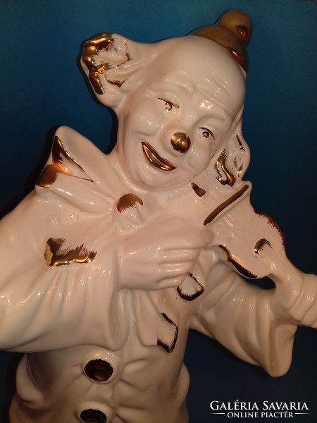 Italian huge antique porcelain clown figurine painted in gold porcelain