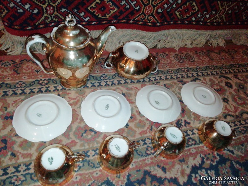 I am offering for sale an antique very fine porcelain coffee set, gilded