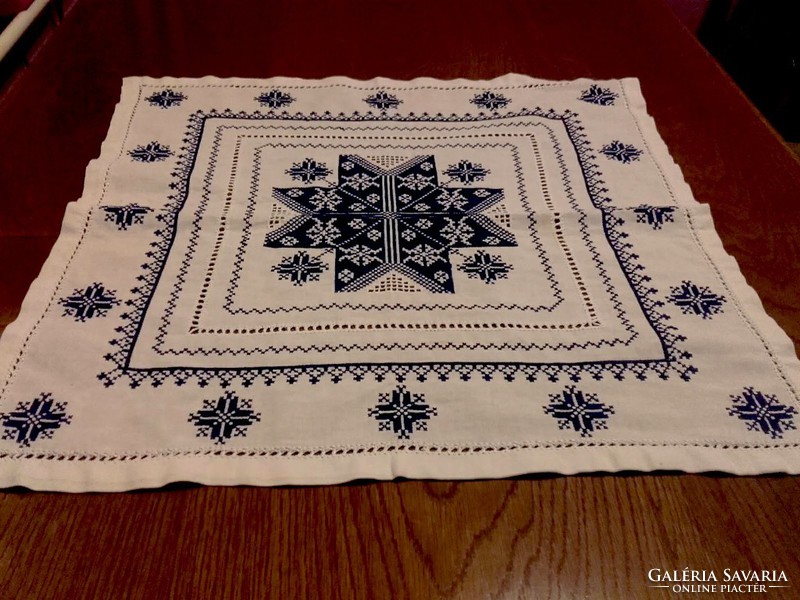 A beautiful, very showy antique tablecloth, made with various embroidery techniques